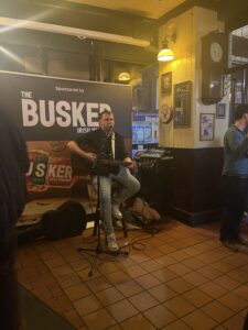 Busker Ricky Kelleher playing live music at Costigan's Pub